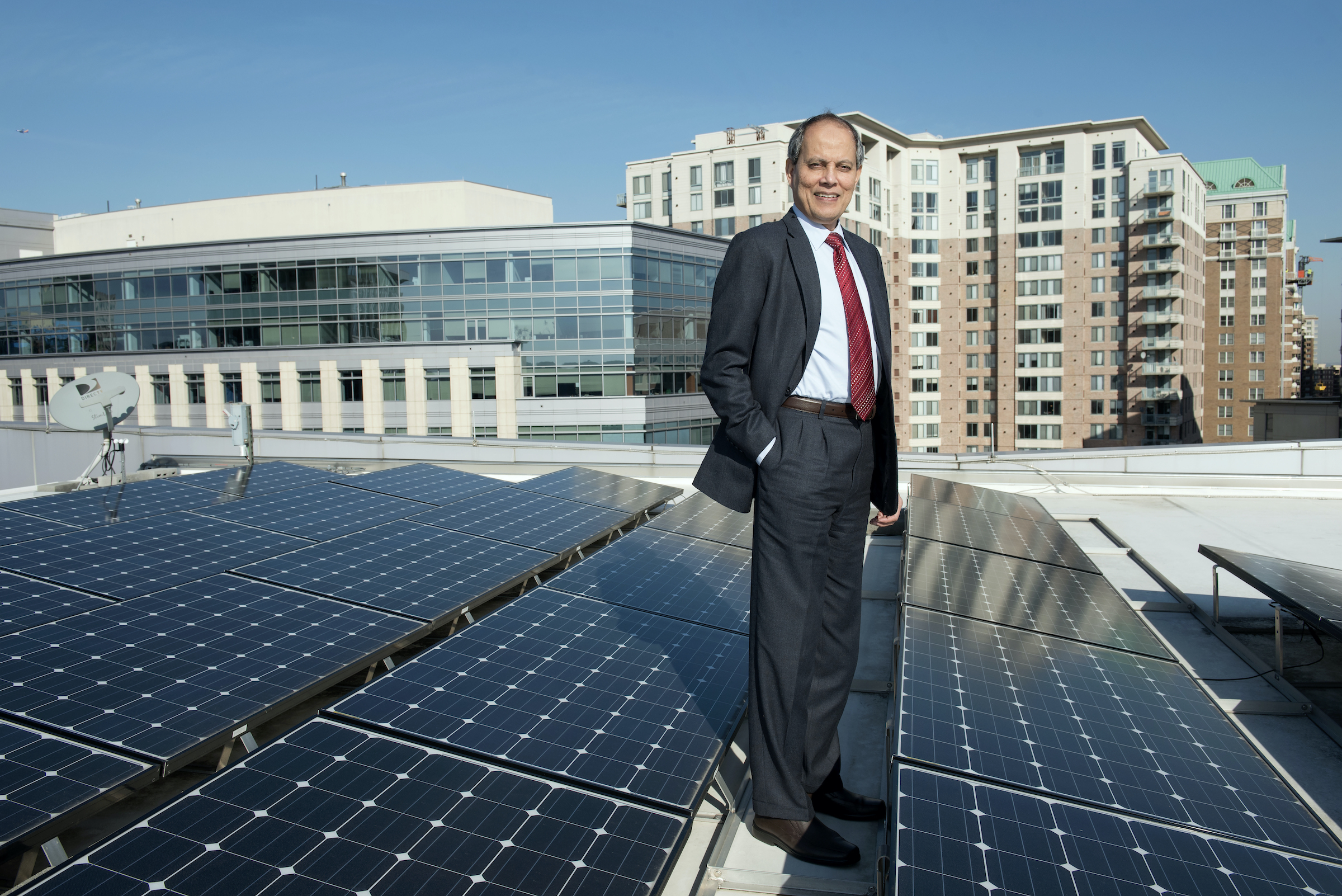 Saifur Rahman, Advanced Research Institute, with his photovoltaic installation on the roof of Virginia Tech's Arlington Research Center in Arlington, VA.